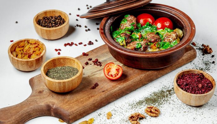 fried-meat-with-greens-tomatoes-clay-pot-min-min